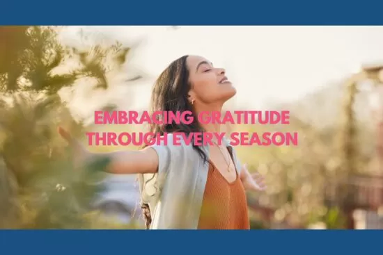 A woman standing with arms open in nature, embracing the moment with joy, symbolizing "Gratitude in Every Season" and a heart growing closer to God.