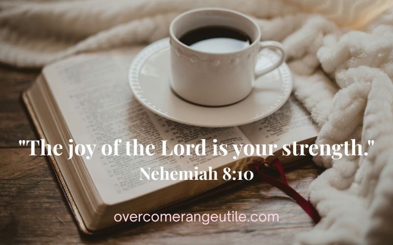 Happier Christian finding peace and strength in God’s Word with Nehemiah 8:10 beside an open Bible and coffee.