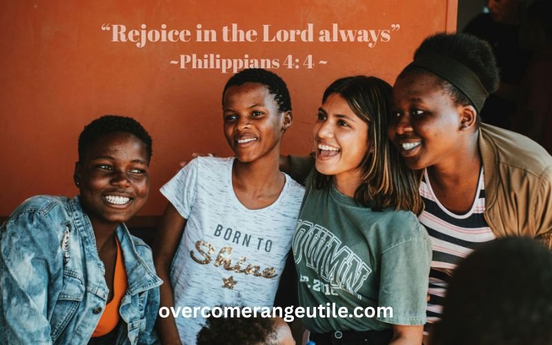 Happy group of friends smiling together with Philippians 4:4 Bible verse about rejoicing in the Lord and living as a happier Christian.